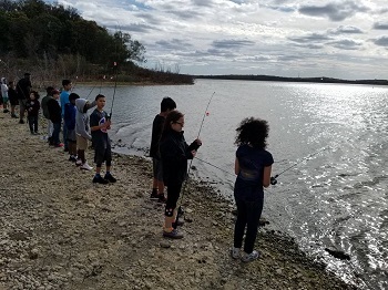 Police Athletic League children fishing